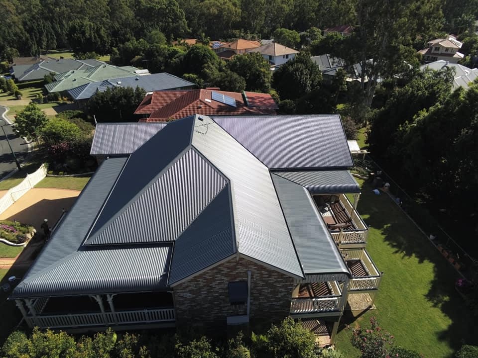 This colour bond roof in Brisbane looks brand new after a roof restoration.